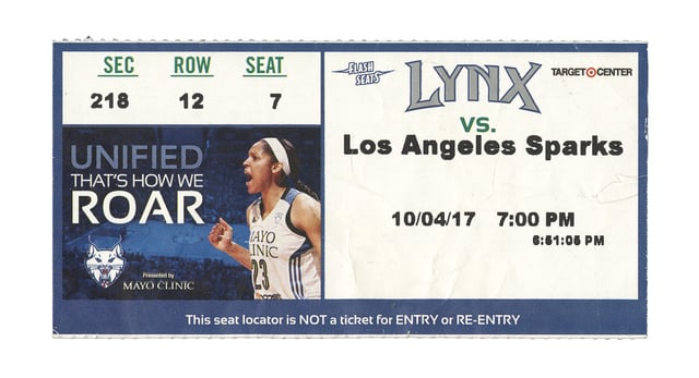Rectangular paper ticket stub with white squares on a blue background and a color picture of Maya Moore.